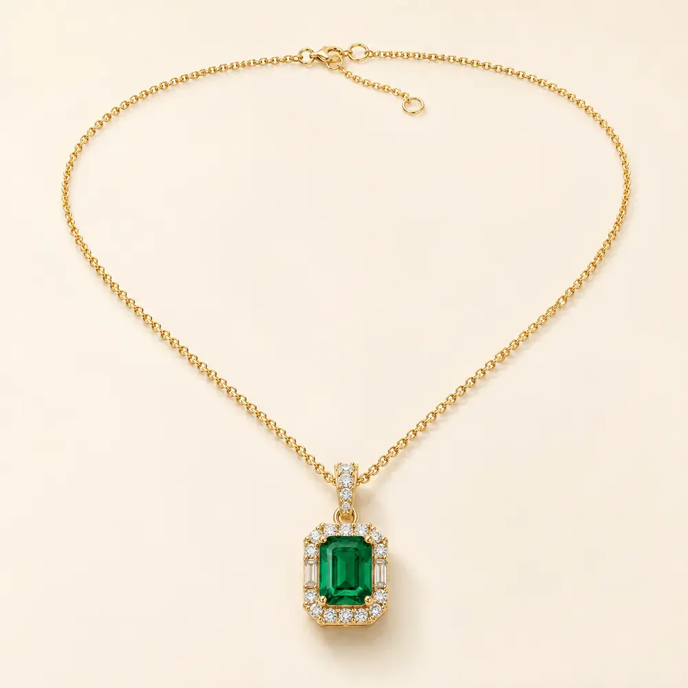 Emerald and diamond pendant necklace in yellow gold